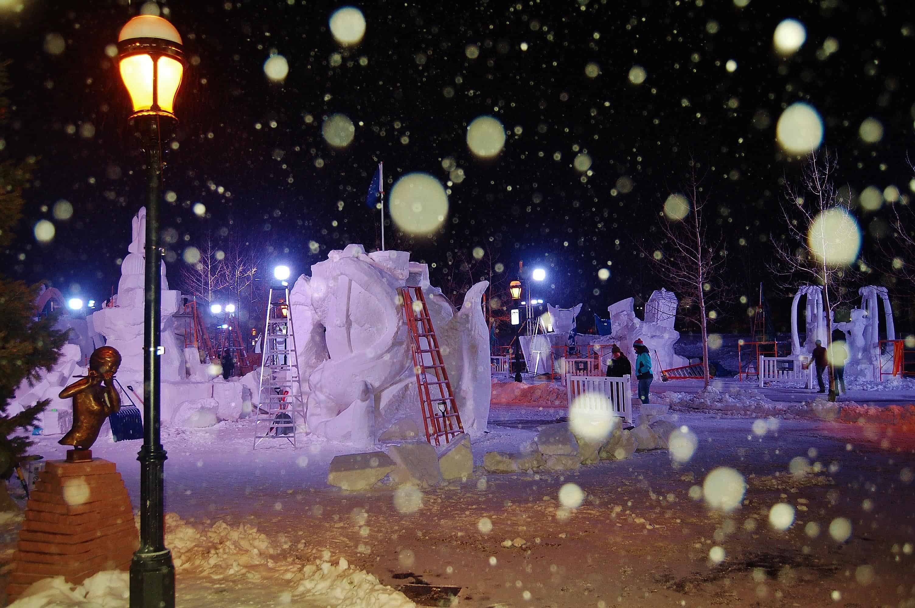 The Friday before the close of sculpting, teams work through the night to complete their masterpieces, each constructed from a 12-foot-tall, 20-ton block of Colorado snow.