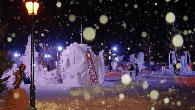 The Friday before the close of sculpting, teams work through the night to complete their masterpieces, each constructed from a 12-foot-tall, 20-ton block of Colorado snow.