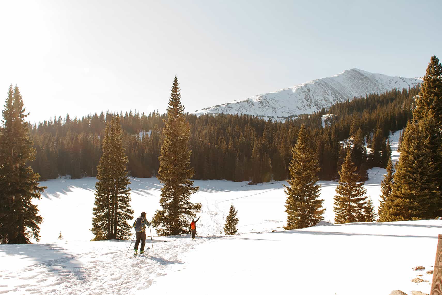 people walking through snow in Colorado