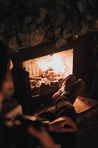 Shoes up on fireplace