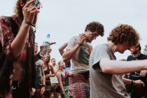 people dancing at outdoor concert