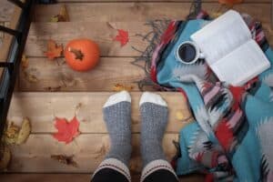 person wearing socks standing on deck 