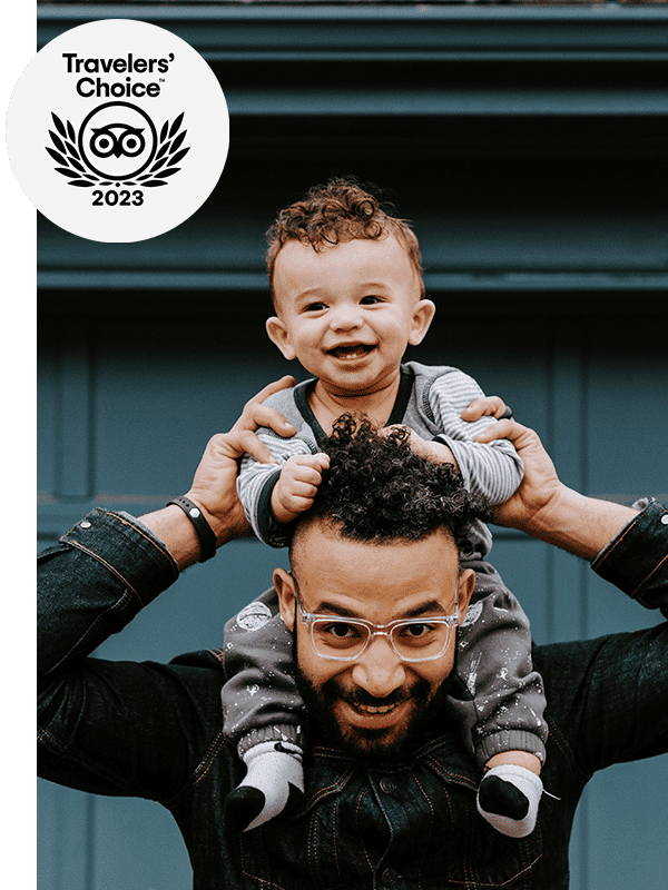 Toddler on man's shoulder
