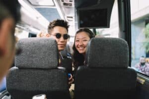 duo smiling for camera in shuttle