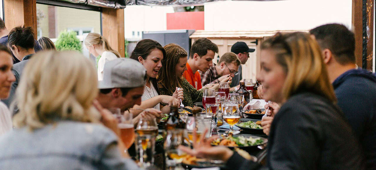 Group dining out on patio