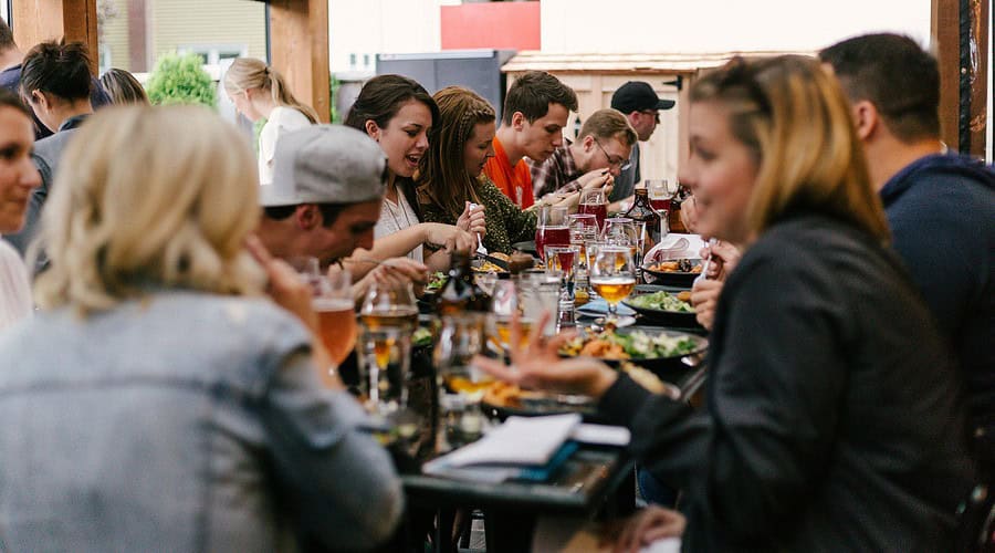Group dining out on patio