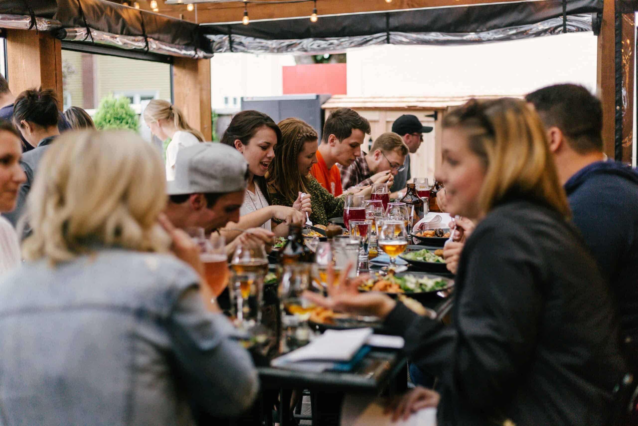 Group dining out on patio